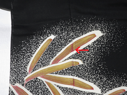 身巾を広げた黒留袖の前部分