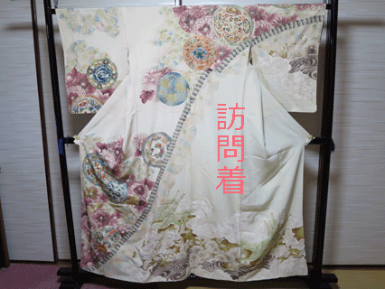 帯にリフォームした豪華な訪問着