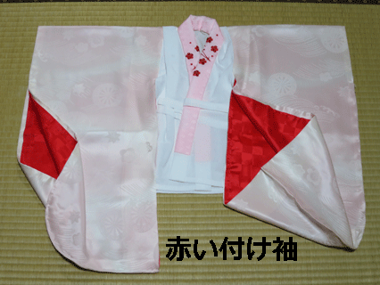 茶色シミを除去した宮参り掛け着。